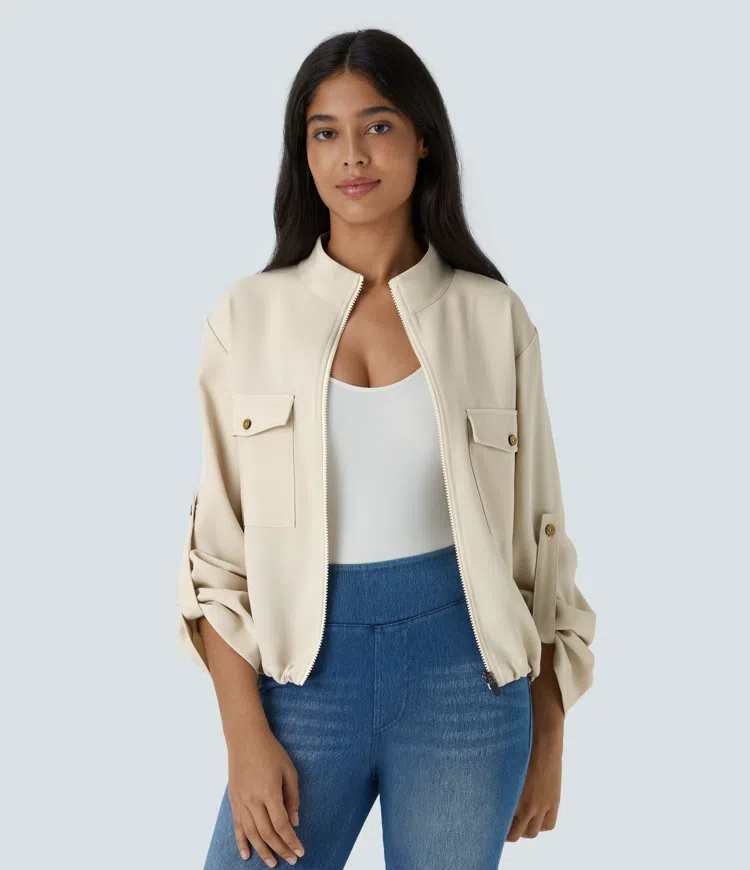 Stand collar roll tab sleeve flap pocket interior drawstring bottom zipper casual jacket