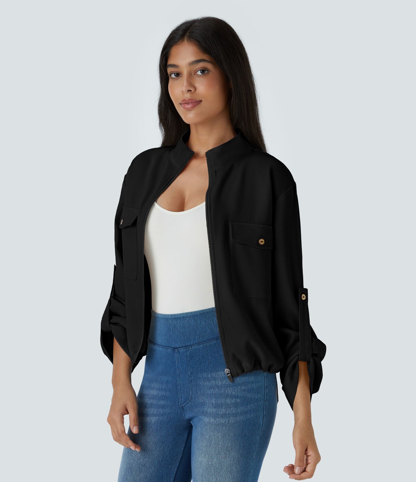 Chaqueta cuello alto manga enrollable bolsillo solapa cordón interior dobladillo cremallera