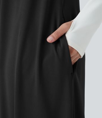 Mono jogger drapeado bolsillo lateral sin mangas botón capucha delantera