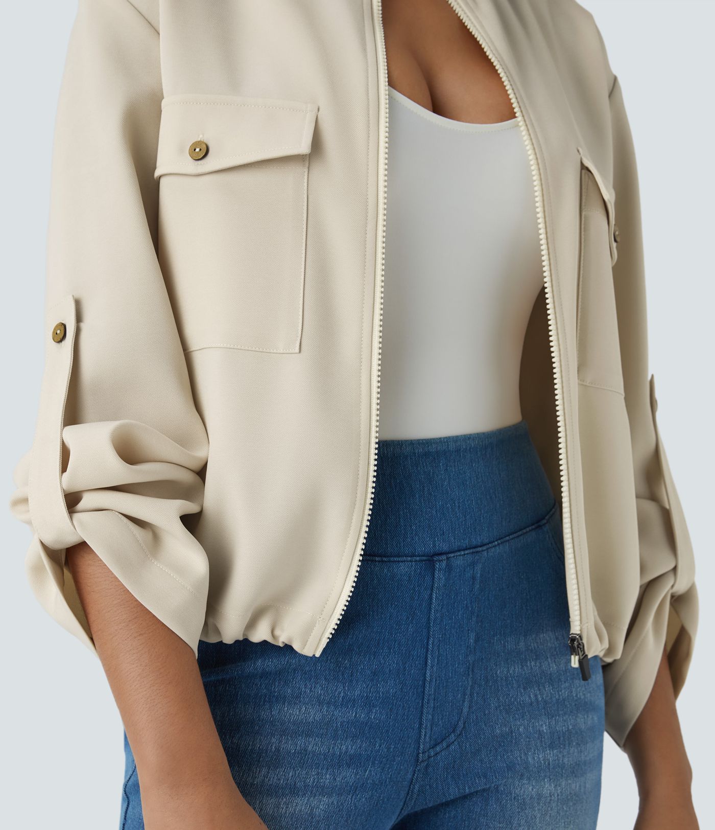 Stand collar Roll tab Sleeves Flap pocket Drawstring inside Hem zip Casual jacket