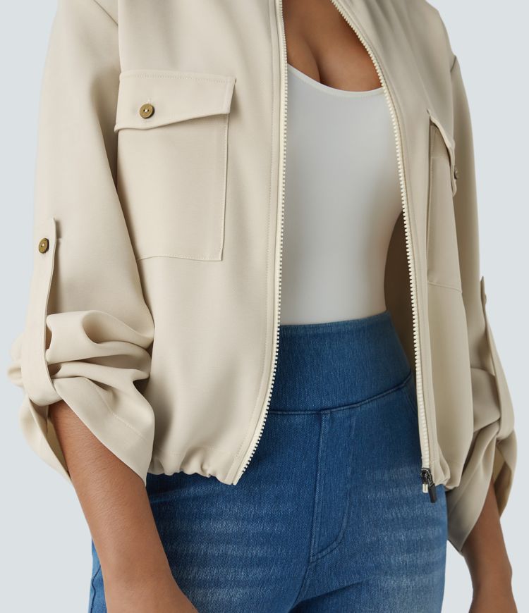 Chaqueta cuello alto manga enrollable bolsillo solapa cordón interior dobladillo cremallera