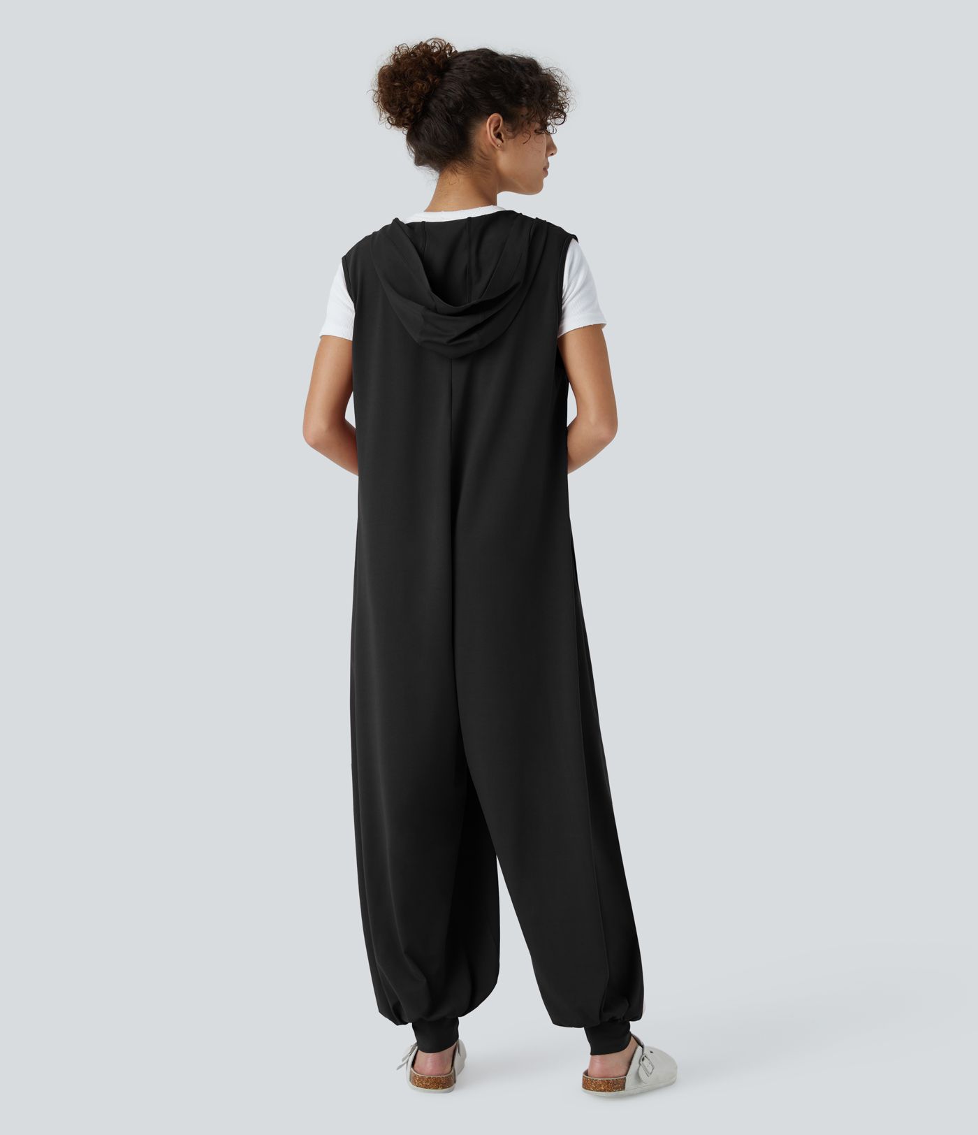 Mono jogger drapeado bolsillo lateral sin mangas botón capucha delantera