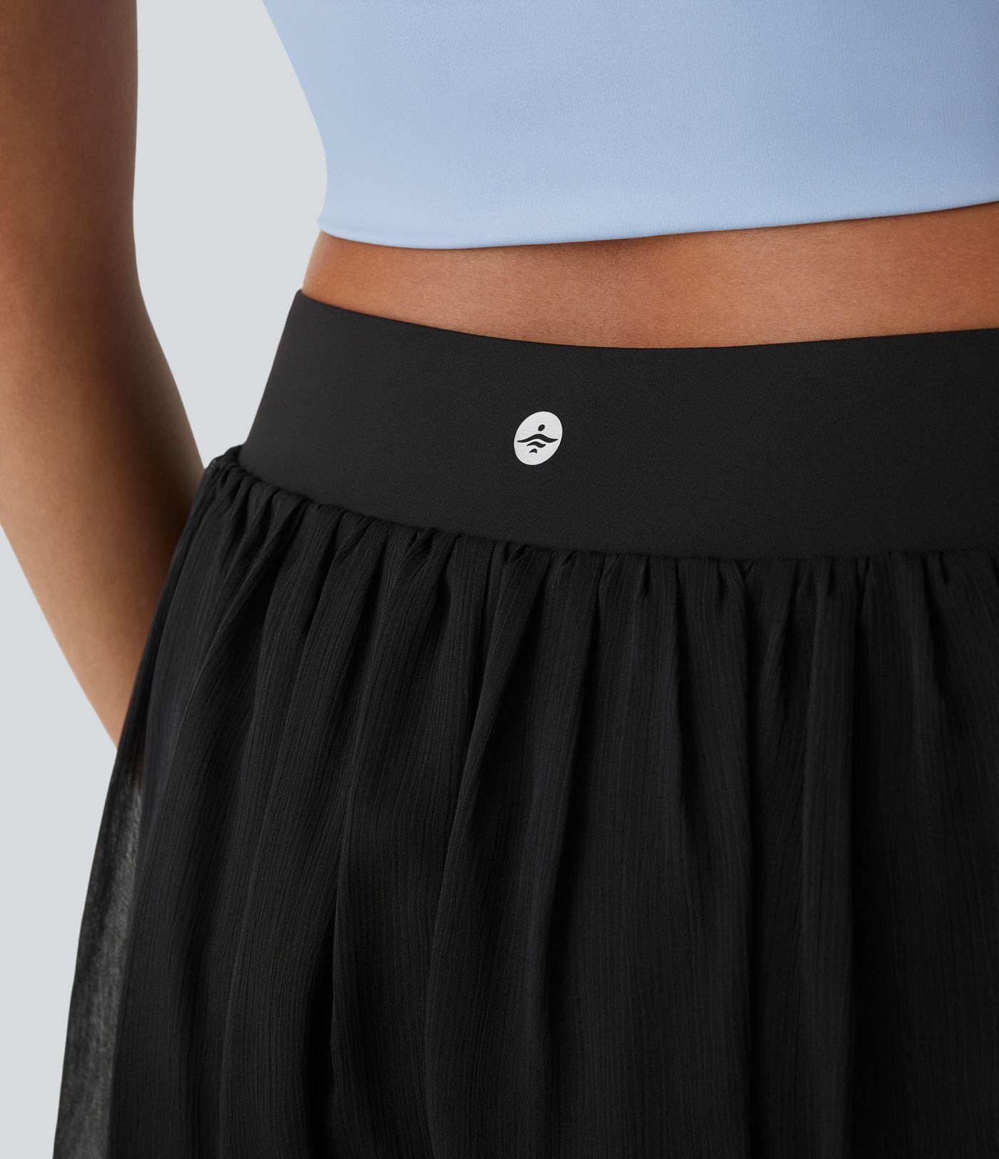 Pantalones cortos de yoga de tiro bajo con cruce, bolsillos y transparencia 2 en 1