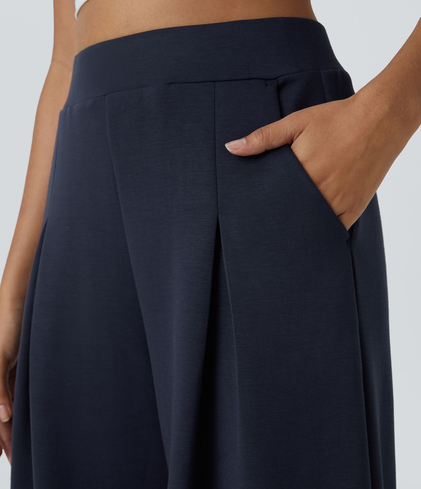 Pantalón pierna ancha bolsillo lateral tiro alto