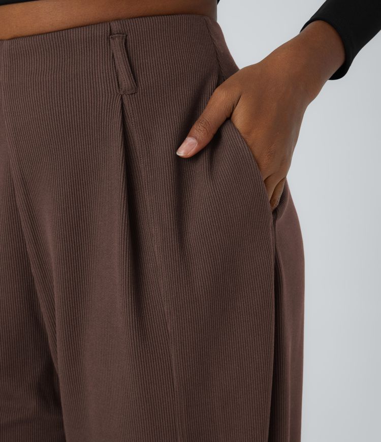 Pantalón deportivo tiro alto dobladillo ajustable bolsillo lateral acanalado