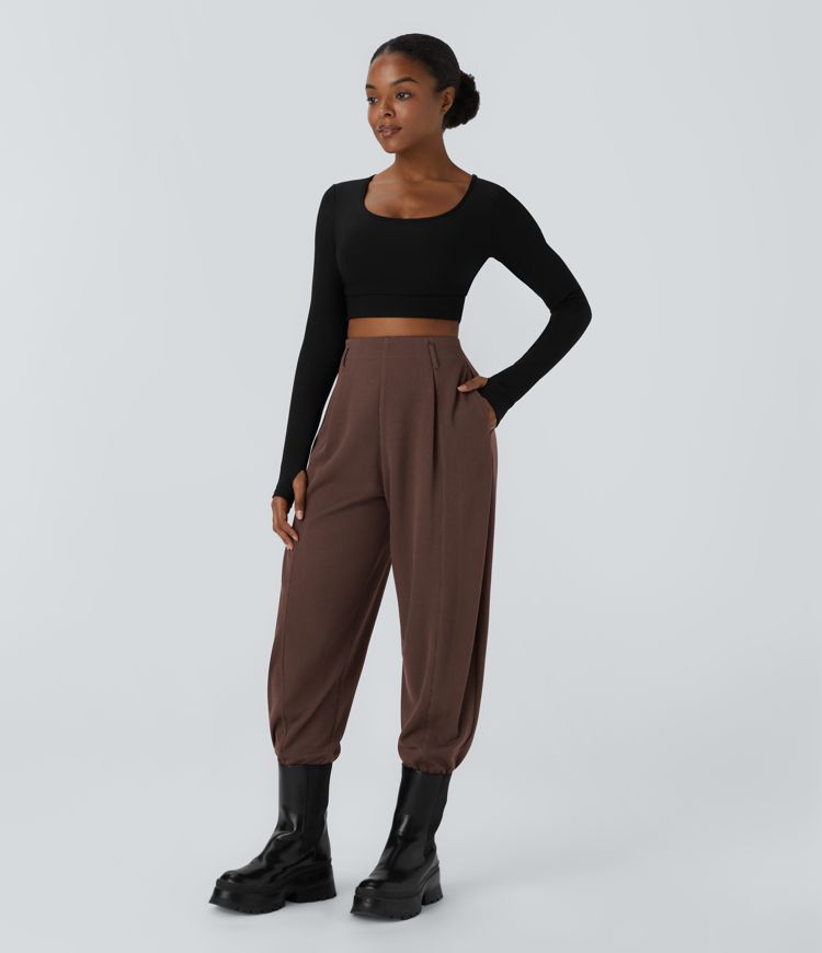 Pantalón deportivo tiro alto dobladillo ajustable bolsillo lateral acanalado