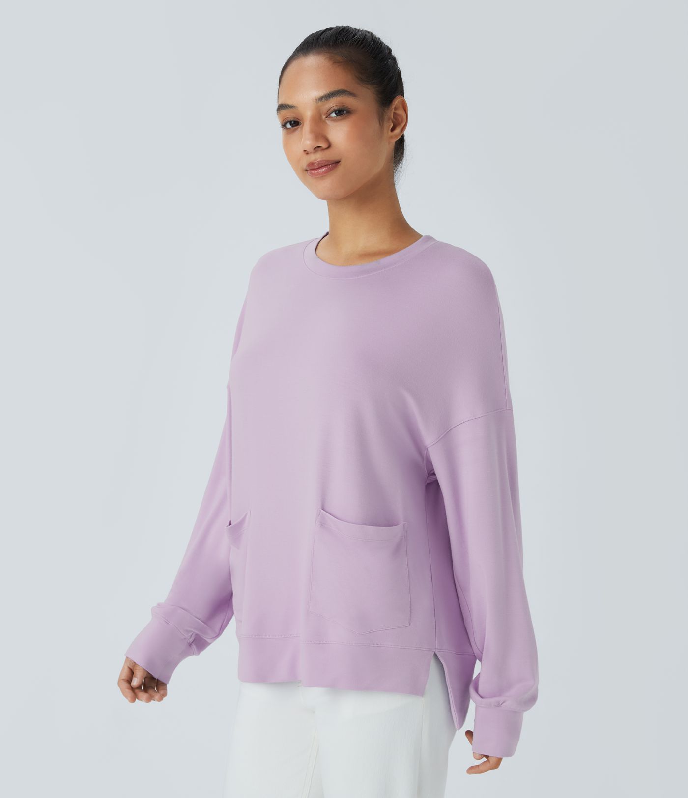 Sudadera cuello redondo manga larga bolsillo lateral delantero abertura alta baja gran tamaño