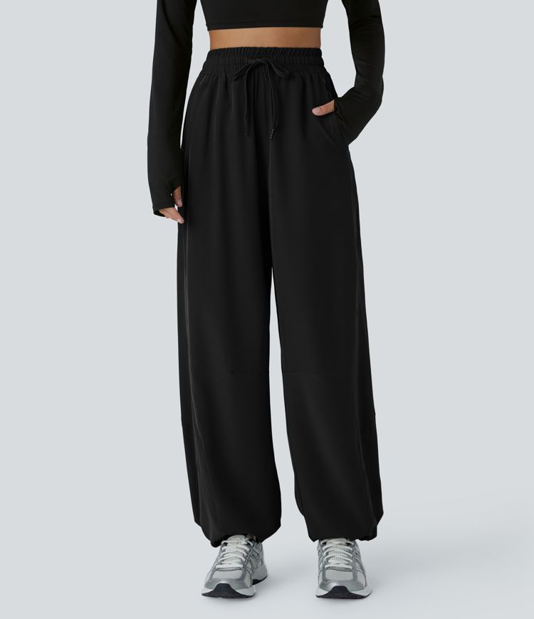 Joggers mit hohem Bund, Kordelzug, Seitentasche, verstellbarem Saum