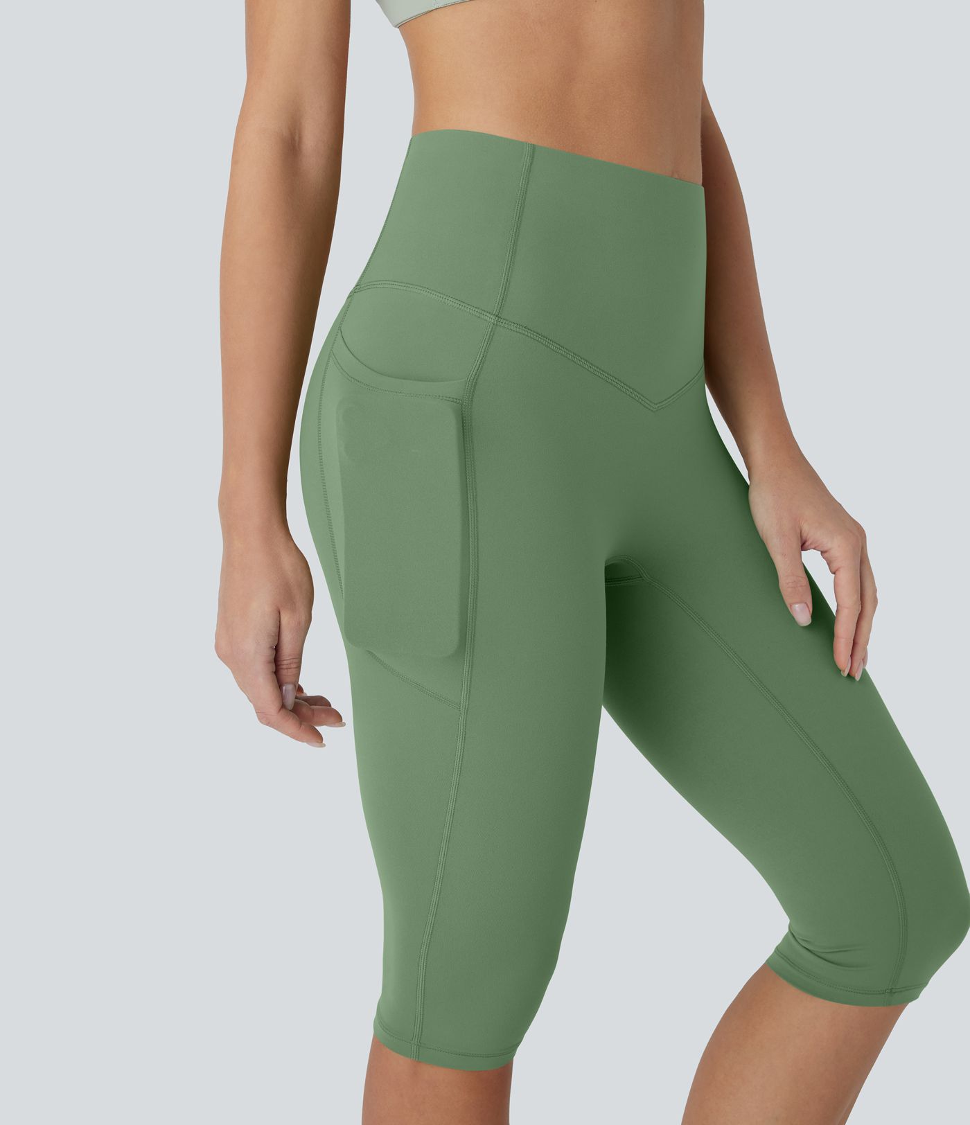 Halara UltraSculpt™ - Pedal-Pusher-Yoga-Leggings mit hohem Bund, Seitentaschen und Bauchkontrolle