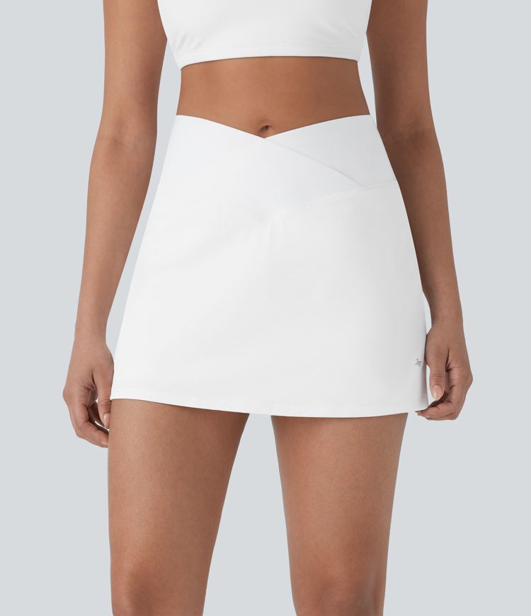 Softlyzero™ QuickDry Crossover High Waisted Tummy Control Built-in Butt Lifting Shorts A-line Mini Tennis Skirt with Pockets