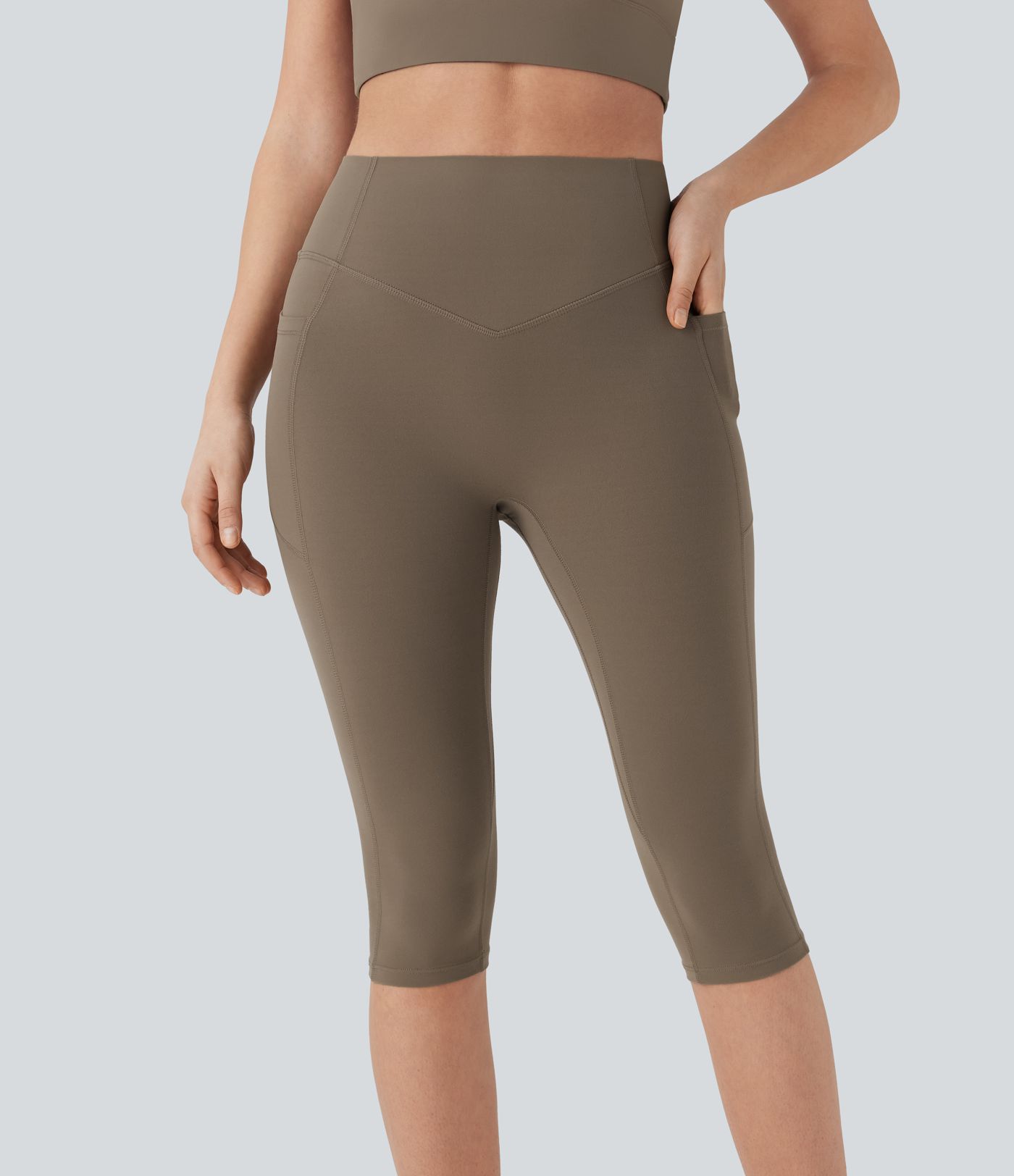 Legging 7/8 corsaire d'entraînement gainant galbant taille haute avec effet scrunch et poches Halara UltraSculpt™