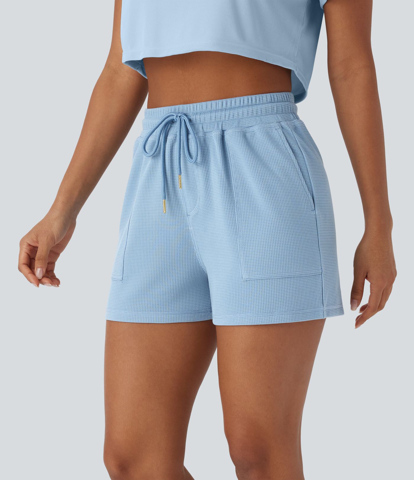 Lässige Shorts mit Seitentaschen, Kordelzug und Waffelstruktur