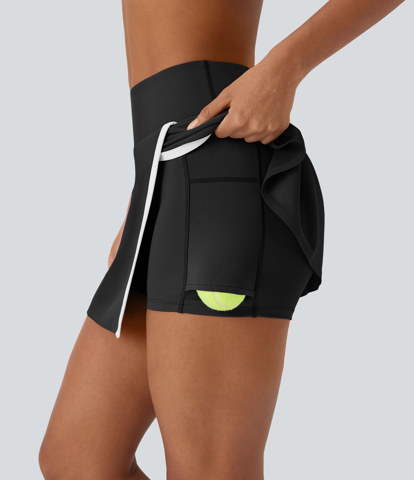 Hoch taillierter 2-in-1-Mini-Tennisrock mit geteiltem Farbblock und Seitentasche