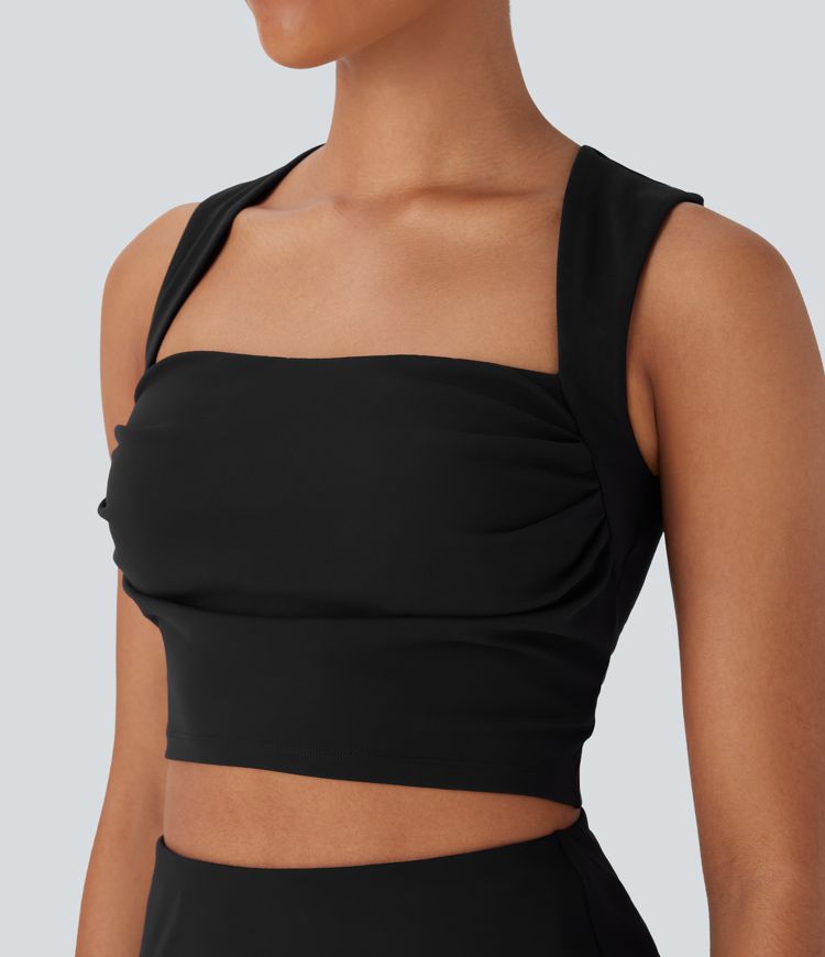 Conjunto de camiseta de tirantes fruncida con cuello cuadrado y falda de yoga 2 en 1 con moldeador de abdomen y bolsillo