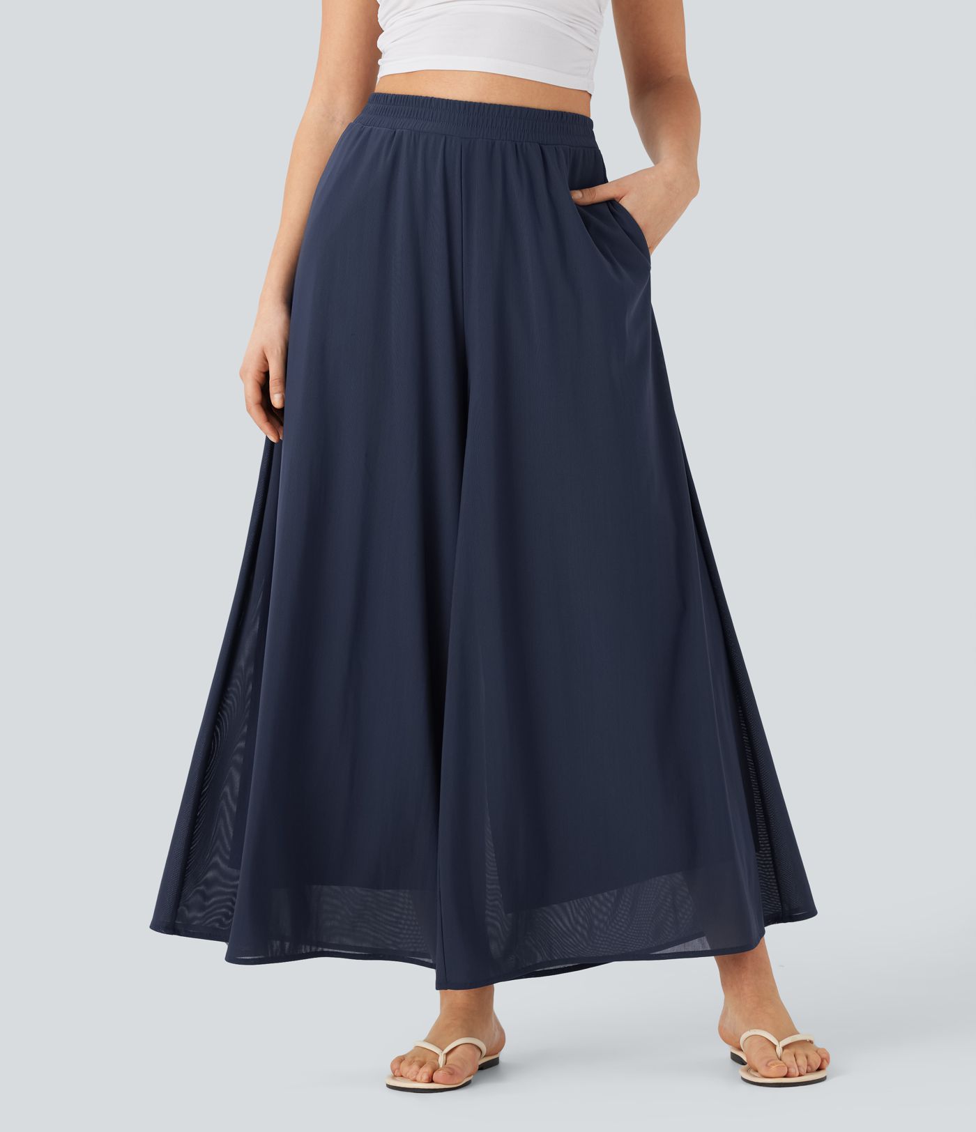 Pantalon fluide et ample avec superposition en mesh, poches latérales et taille haute