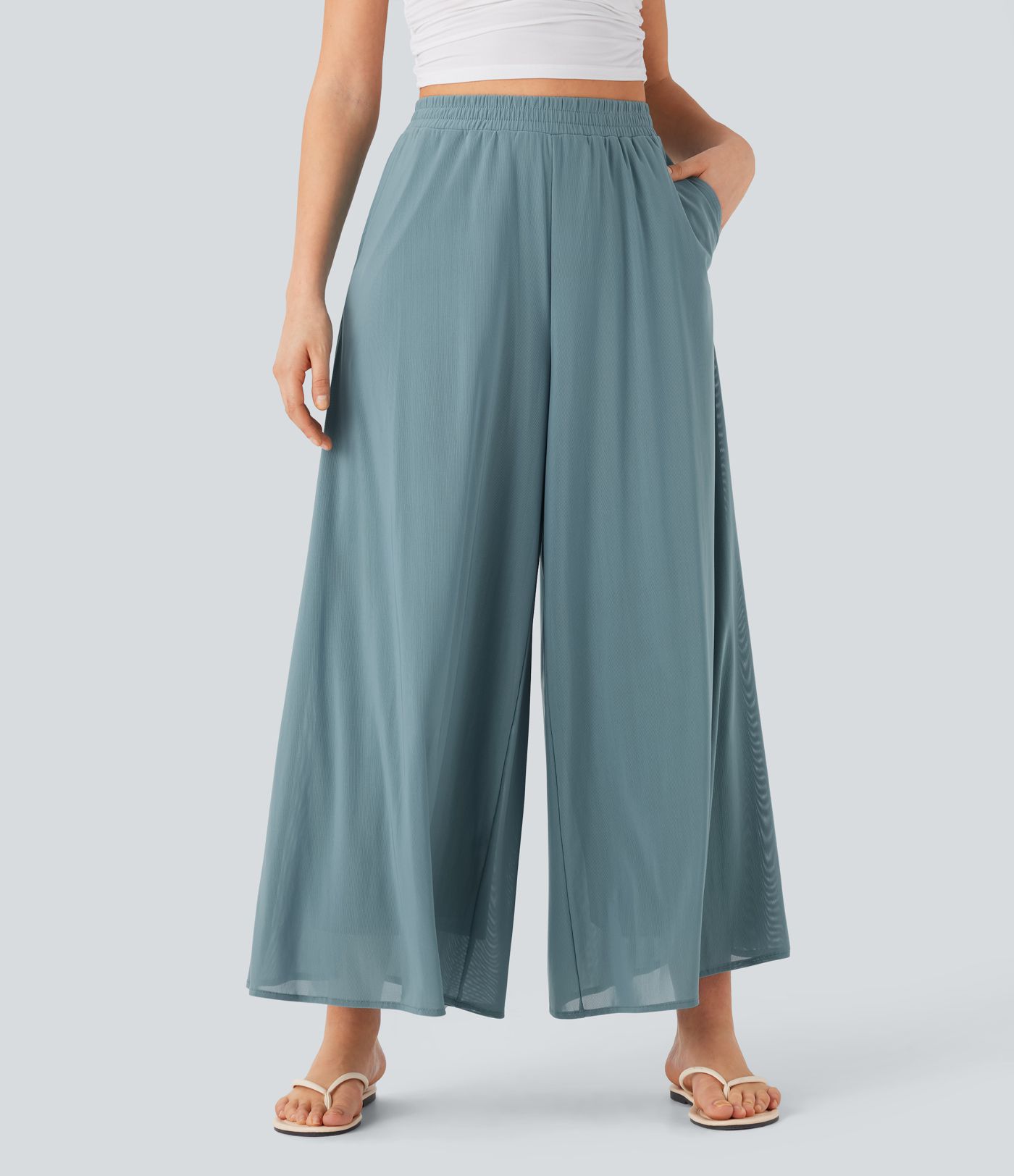 Freizeithose mit hohem Bund, Seitentaschen, kontrastierendem Netzstoff und weitem Bein