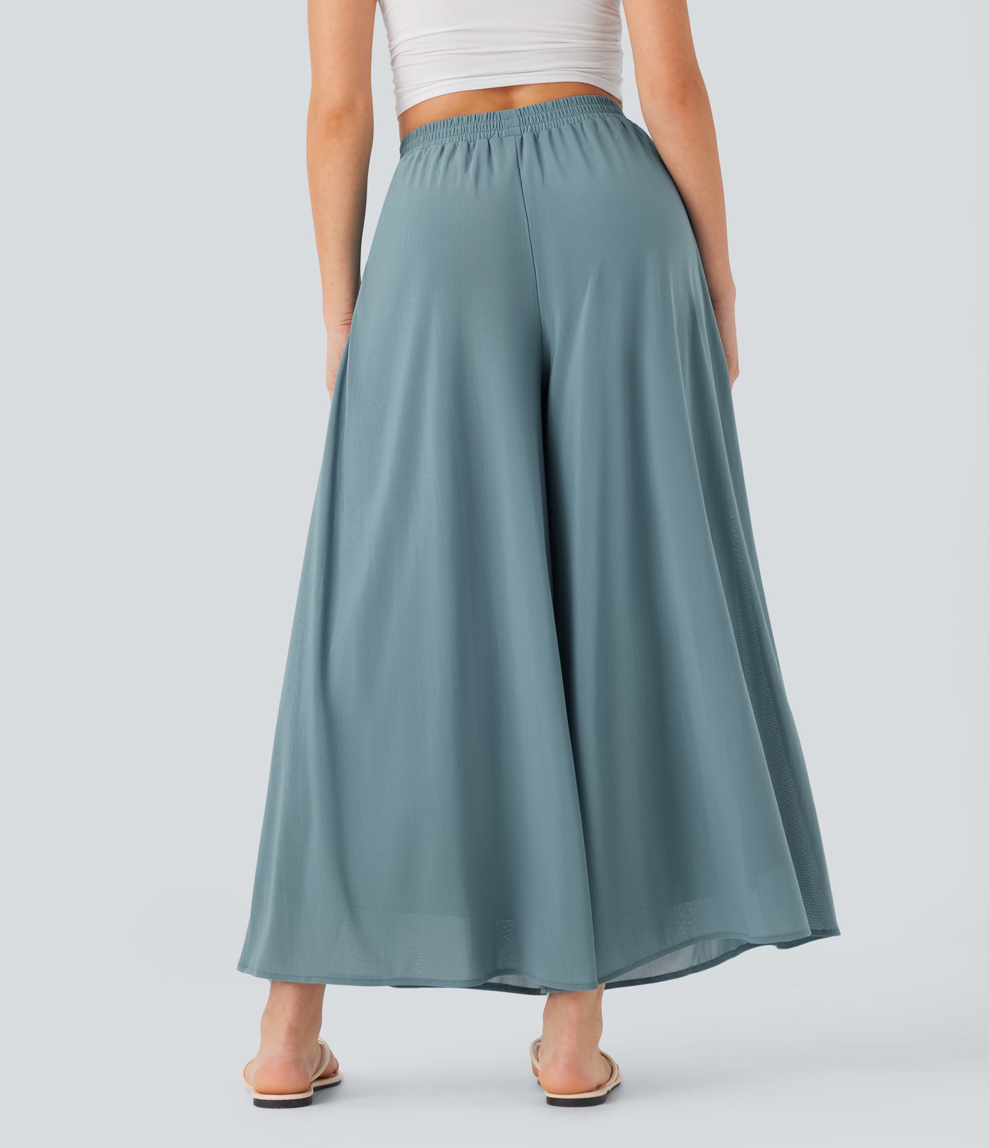 Freizeithose mit hohem Bund, Seitentaschen, kontrastierendem Netzstoff und weitem Bein