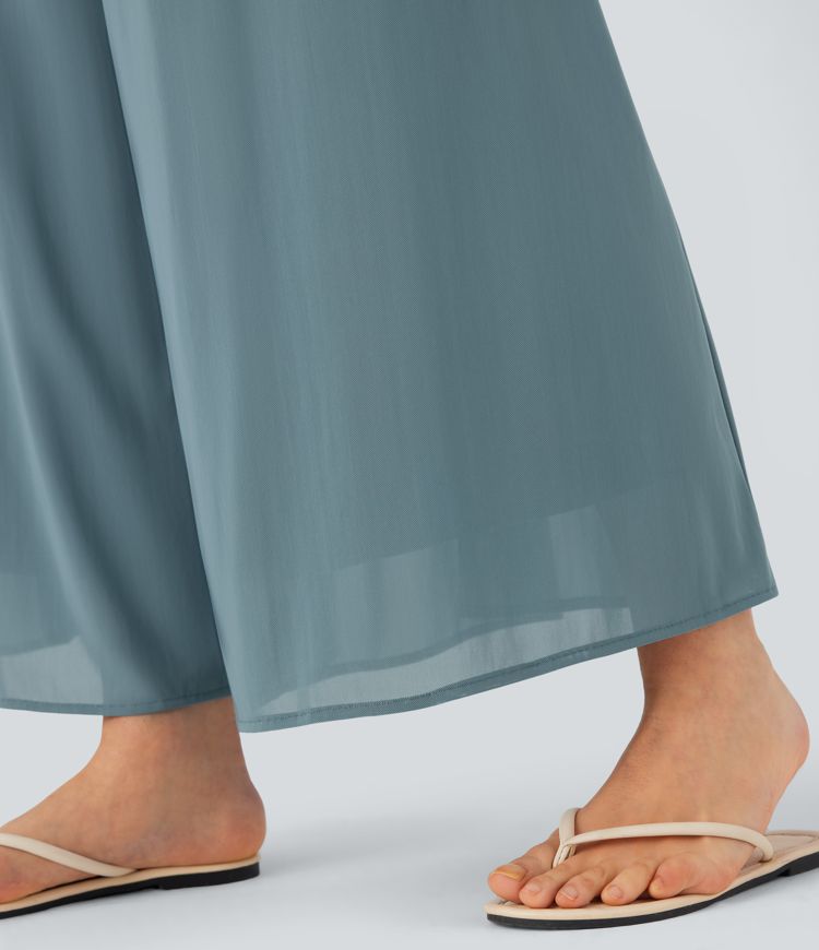 Freizeithose mit hohem Bund, Seitentaschen, kontrastierendem Netzstoff und weitem Bein