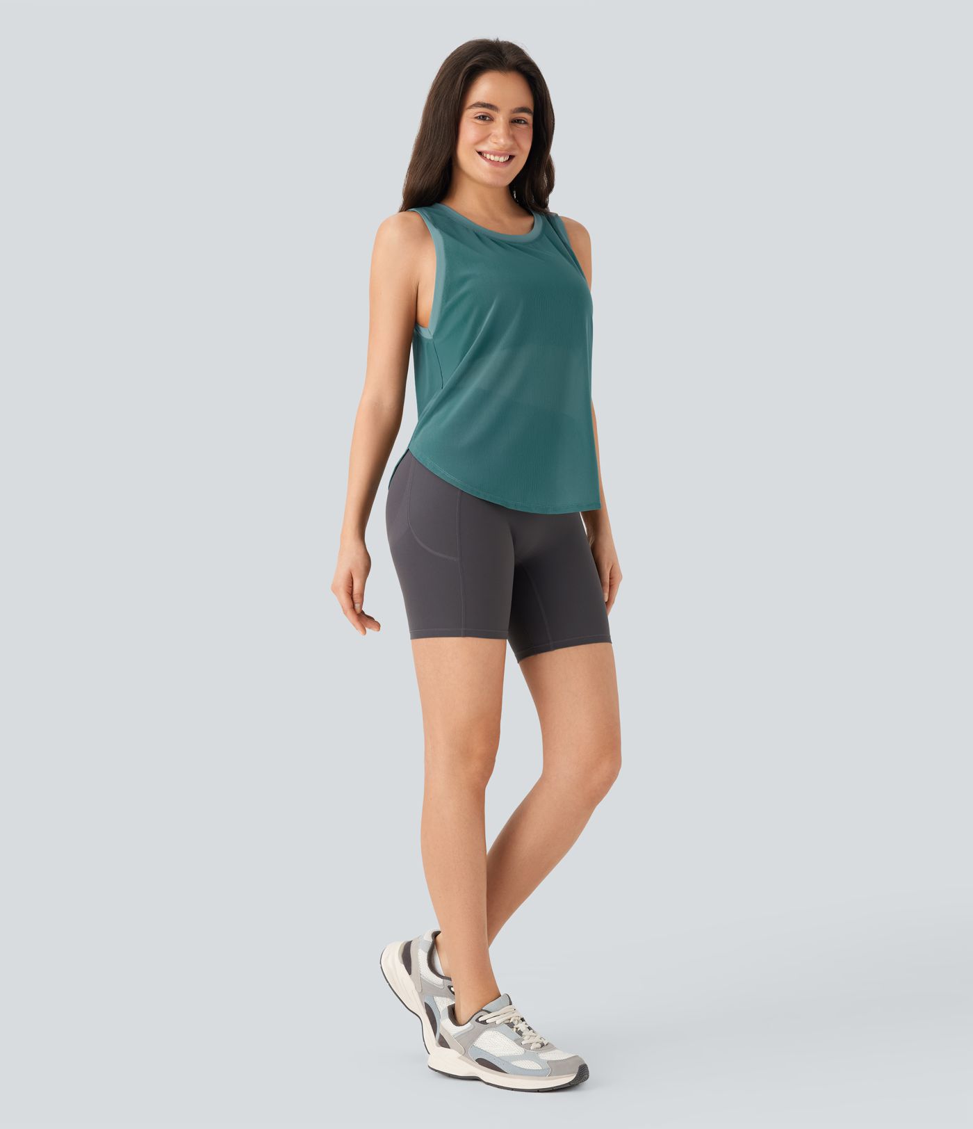 Haut de sport transparent pour yoga sans manches avec ourlet courbé