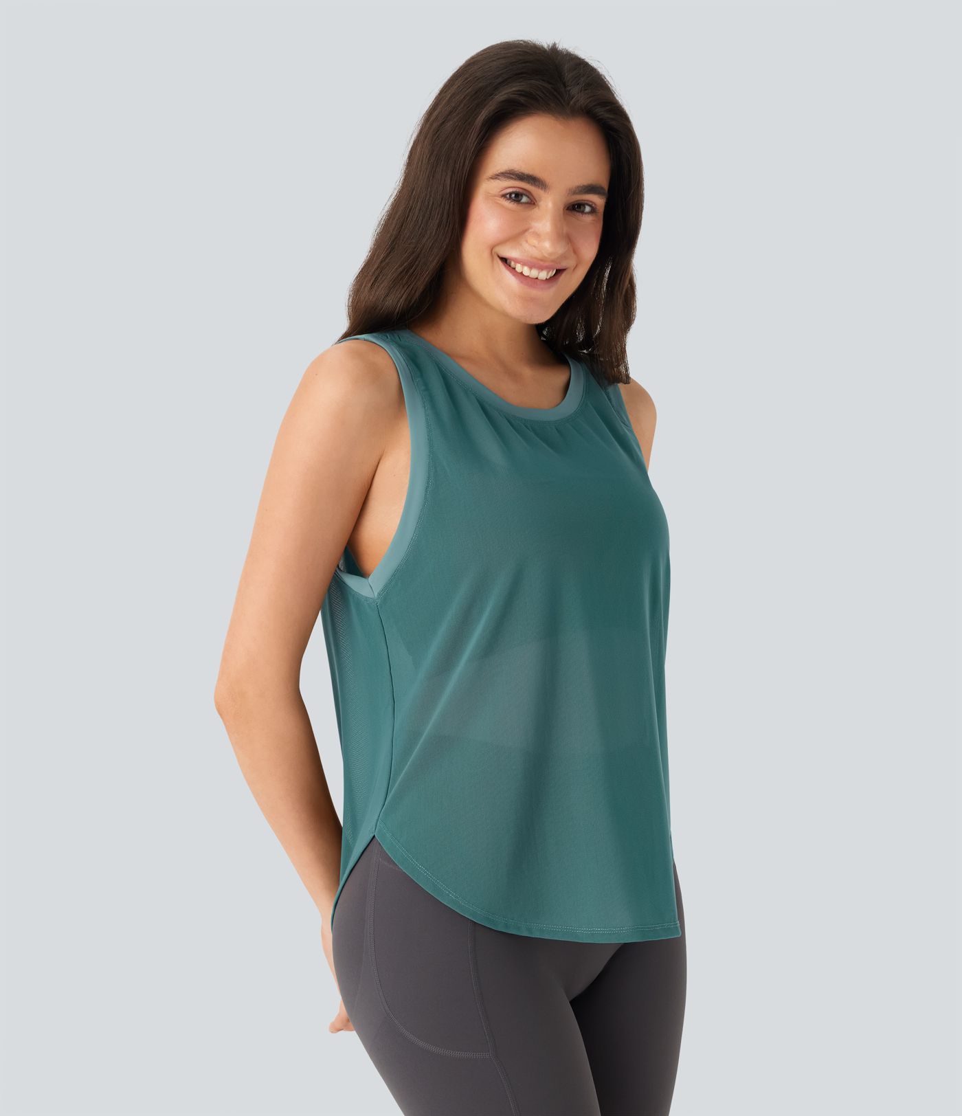 Haut de sport transparent pour yoga sans manches avec ourlet courbé