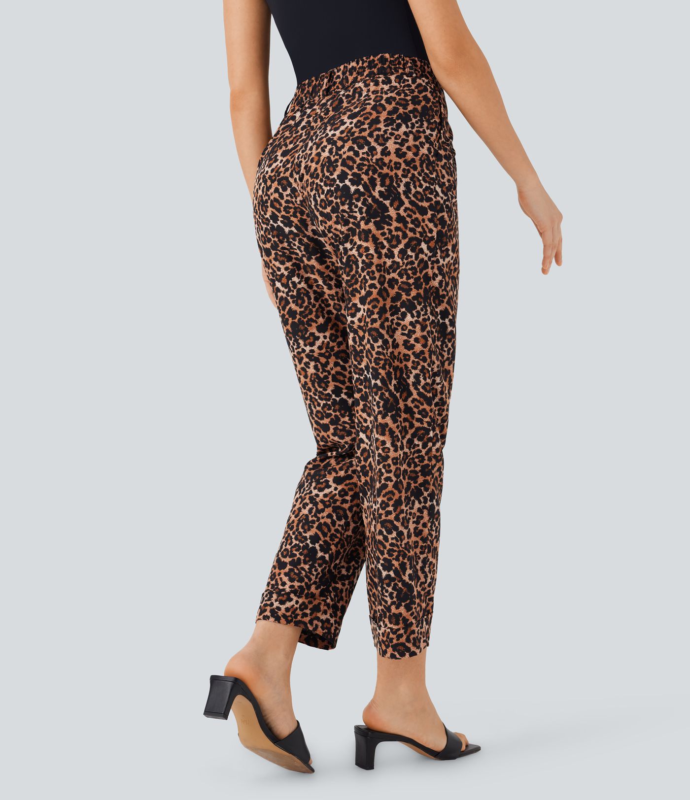 Háar, léopardamynstraðar, lauslegar buxur með vösum