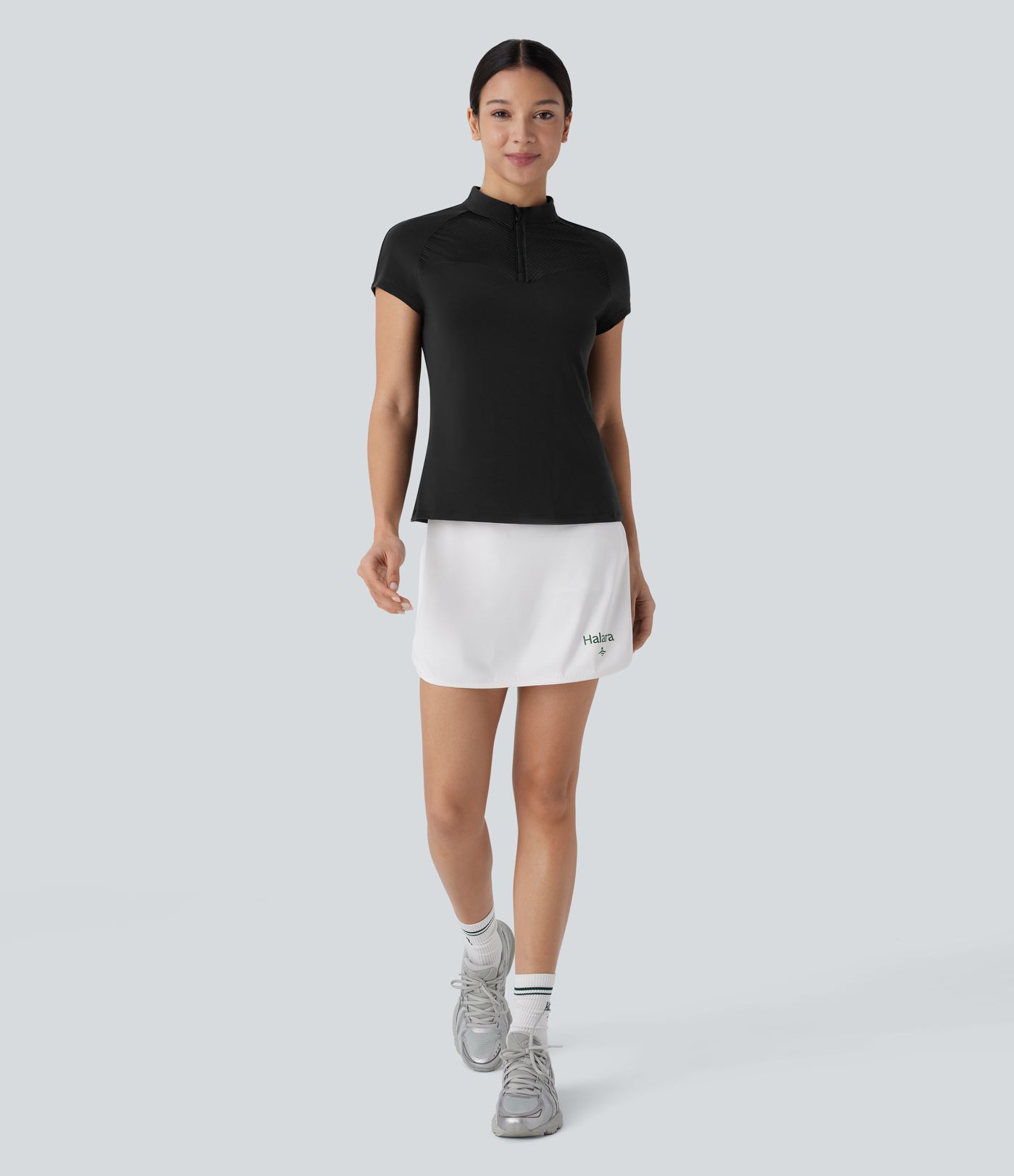 Haut de sport de golf col montant avec empiècements mesh contrastés, zip et séchage rapide