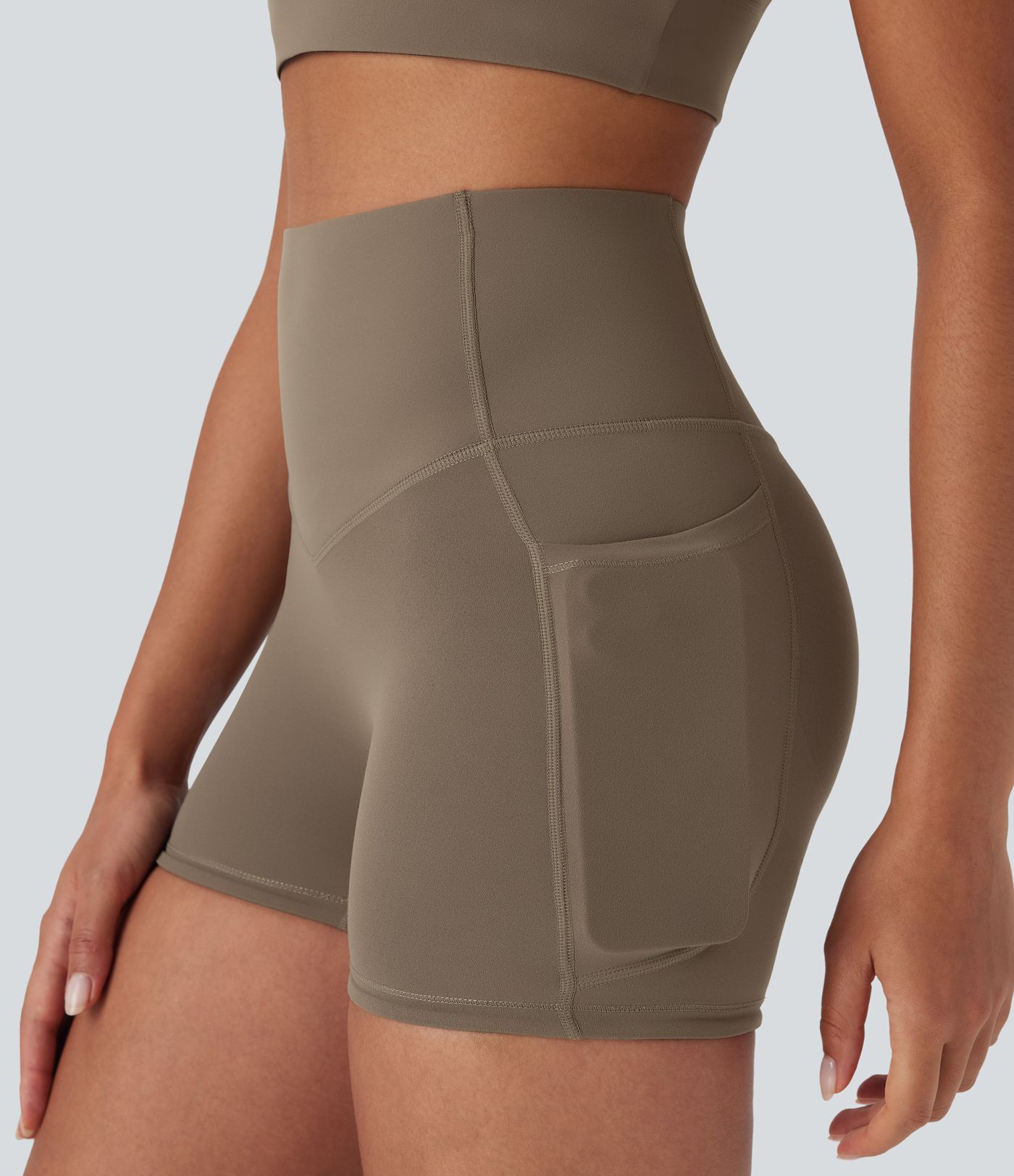 Shorts biker Halara UltraSculpt™ de tiro alto con push-up y reductor de abdomen con bolsillos laterales