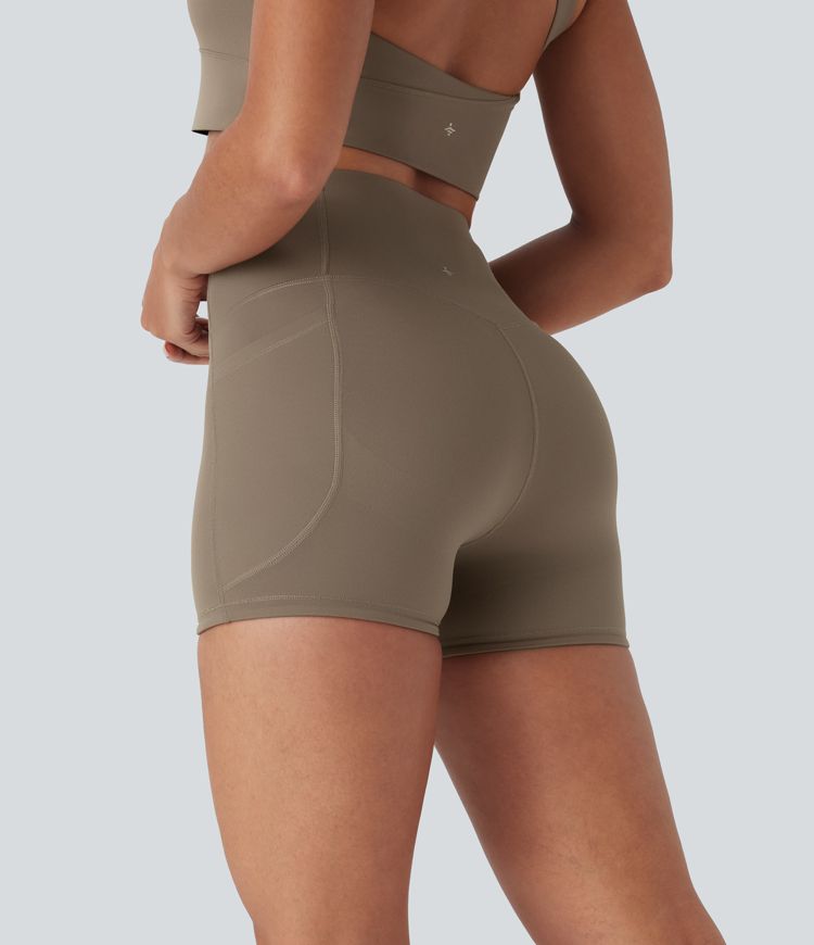 Shorts biker Halara UltraSculpt™ de tiro alto con push-up y reductor de abdomen con bolsillos laterales