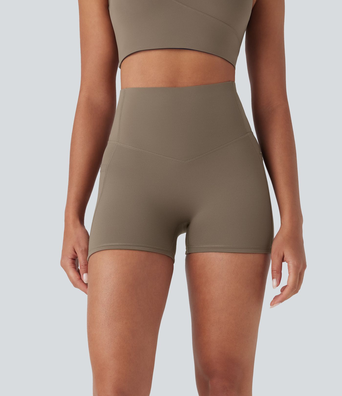 Shorts biker Halara UltraSculpt™ de tiro alto con push-up y reductor de abdomen con bolsillos laterales