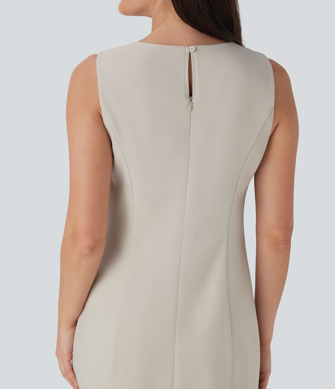 Vestido corto de oficina sin mancas con cuello barco, botones, cremallera invisible y bolsillos