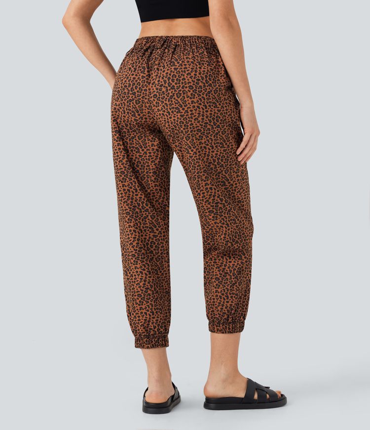 Joggers casuales de algodón con estampado de leopardo y tiro medio con bolsillos
