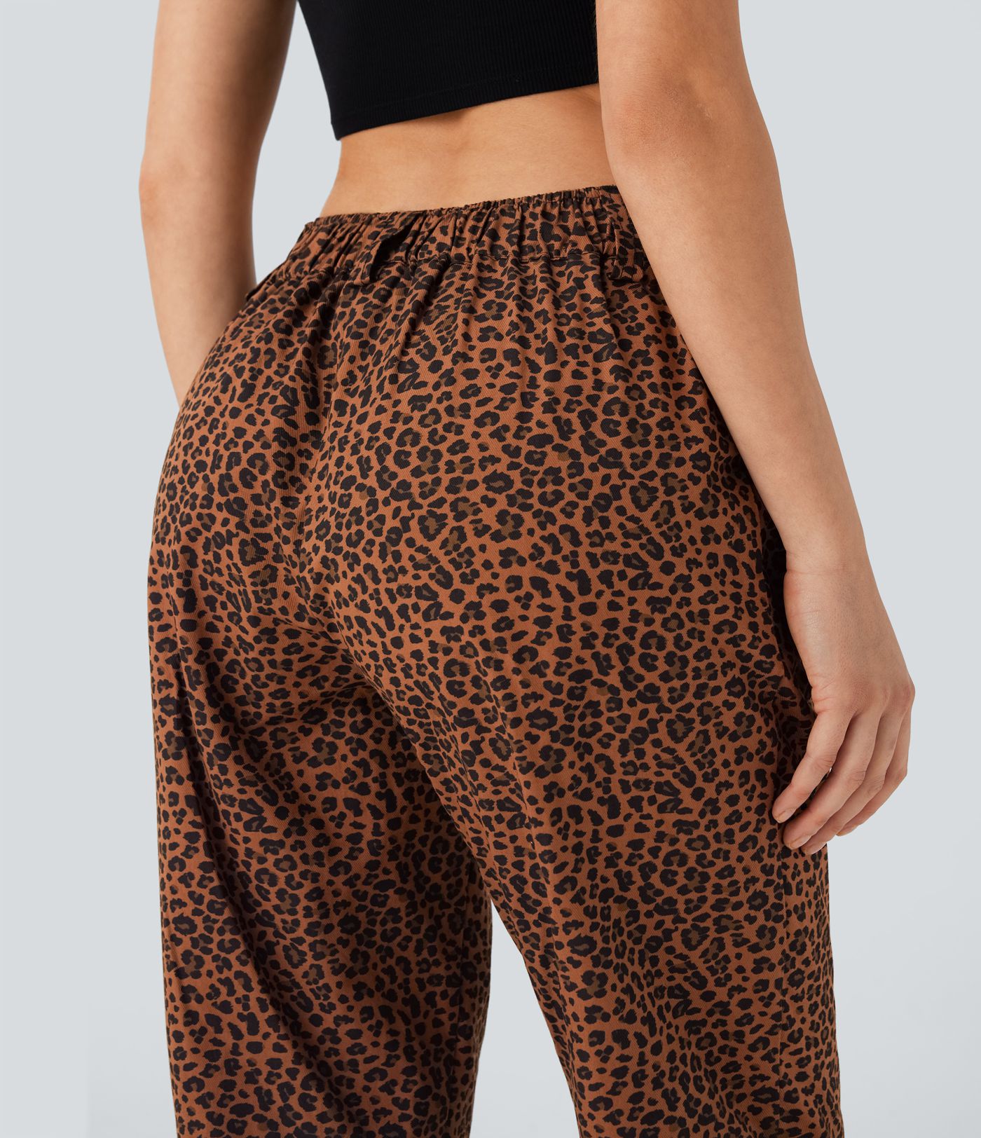 Joggers casuales de algodón con estampado de leopardo y tiro medio con bolsillos