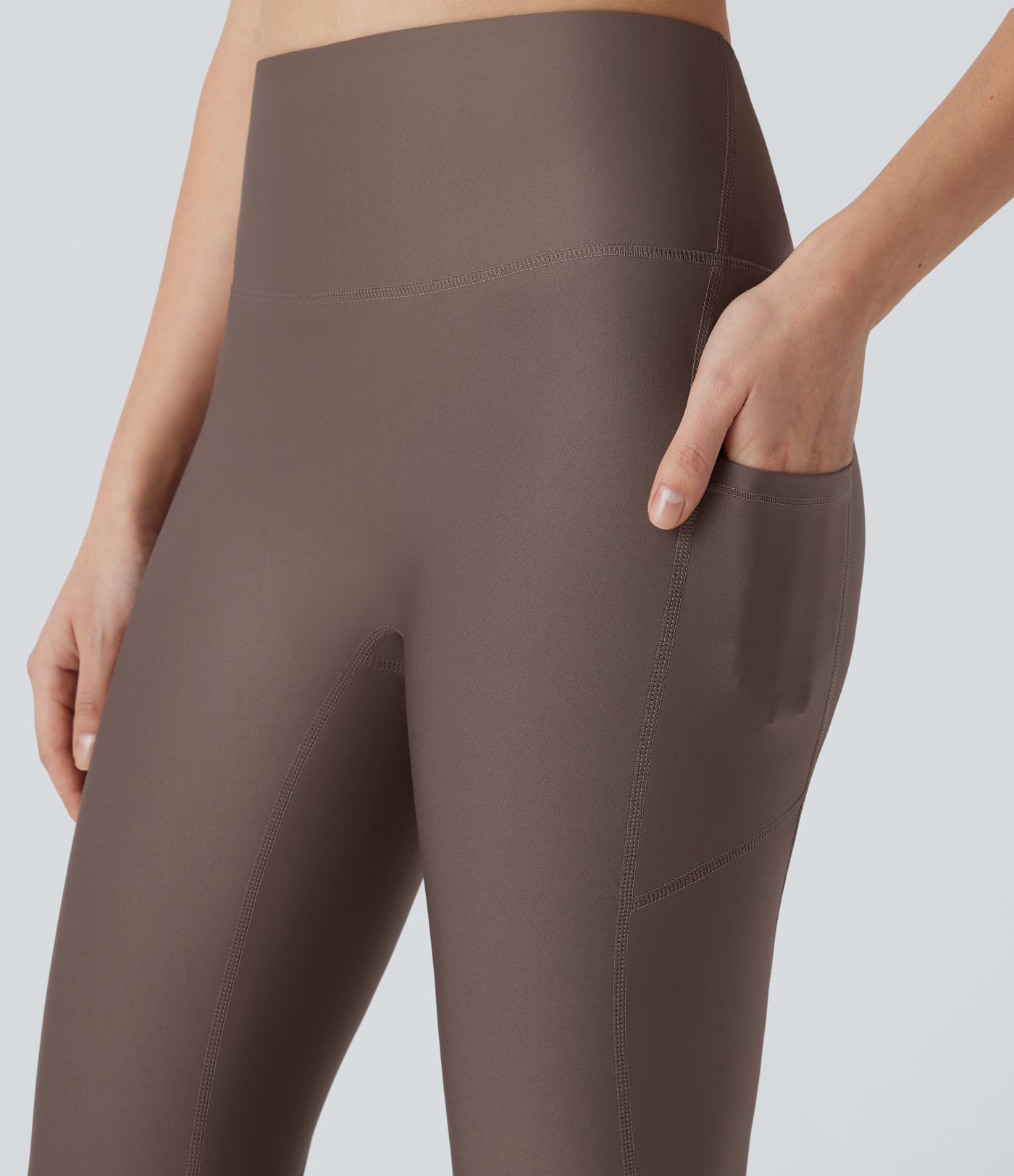 Leggings deportivo tiro alto bolsillo lateral efecto brillante