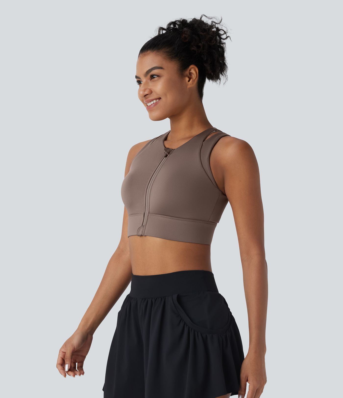 Brassière de danse brillante à maintien léger avec découpes et zip