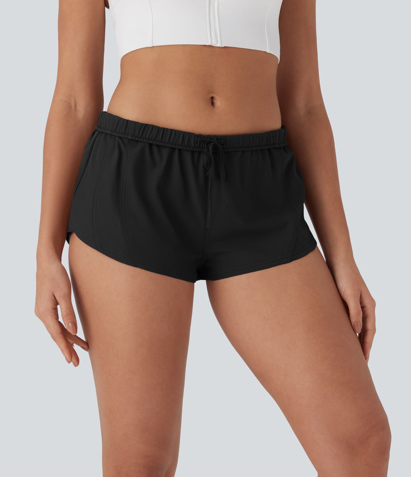 Wasserabweisende 2-in-1-Laufshorts aus Twill mit niedrigem Bund, Gesäßtasche, Kordelzug und Umschlag