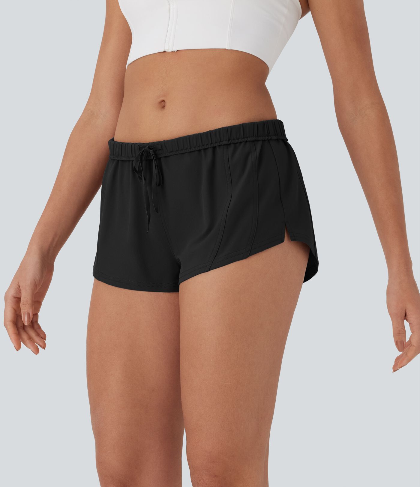 Wasserabweisende 2-in-1-Laufshorts aus Twill mit niedrigem Bund, Gesäßtasche, Kordelzug und Umschlag