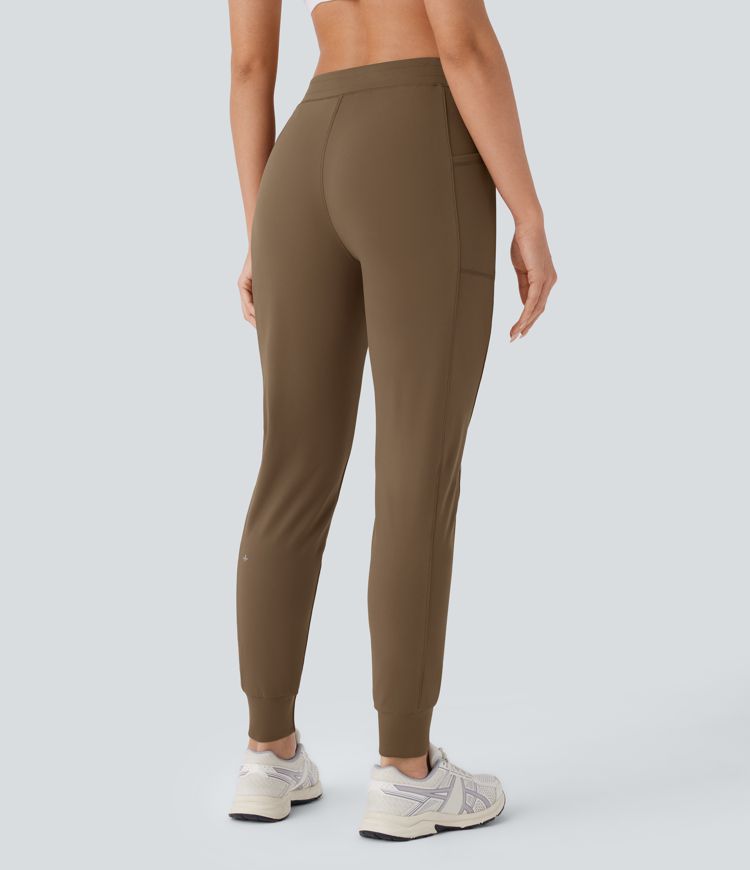 Pantalón  yoga ajustado bolsillo lateral tiro medio