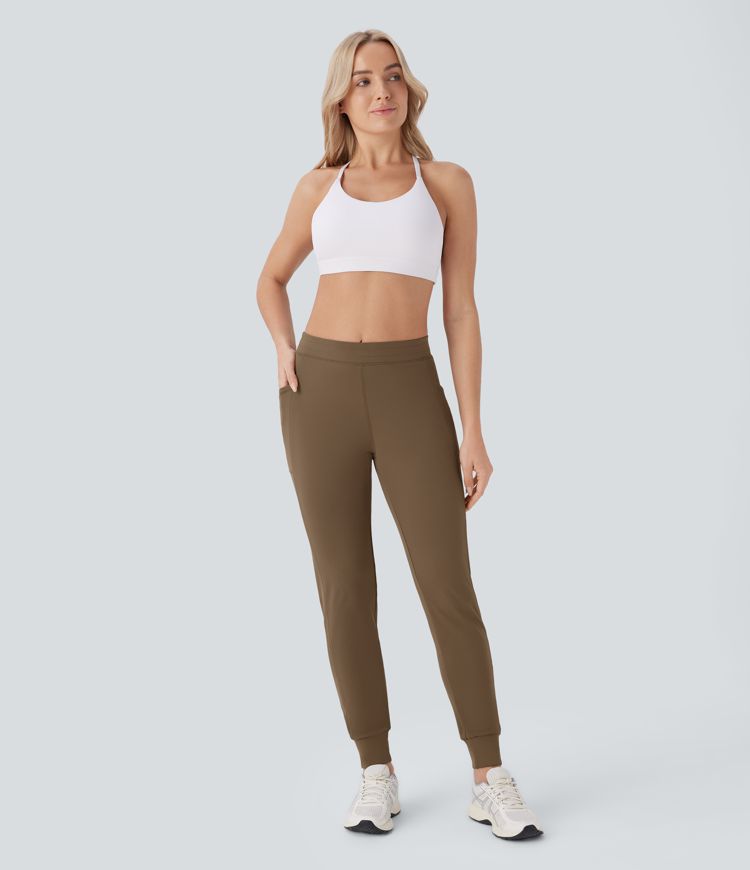 Pantalón  yoga ajustado bolsillo lateral tiro medio