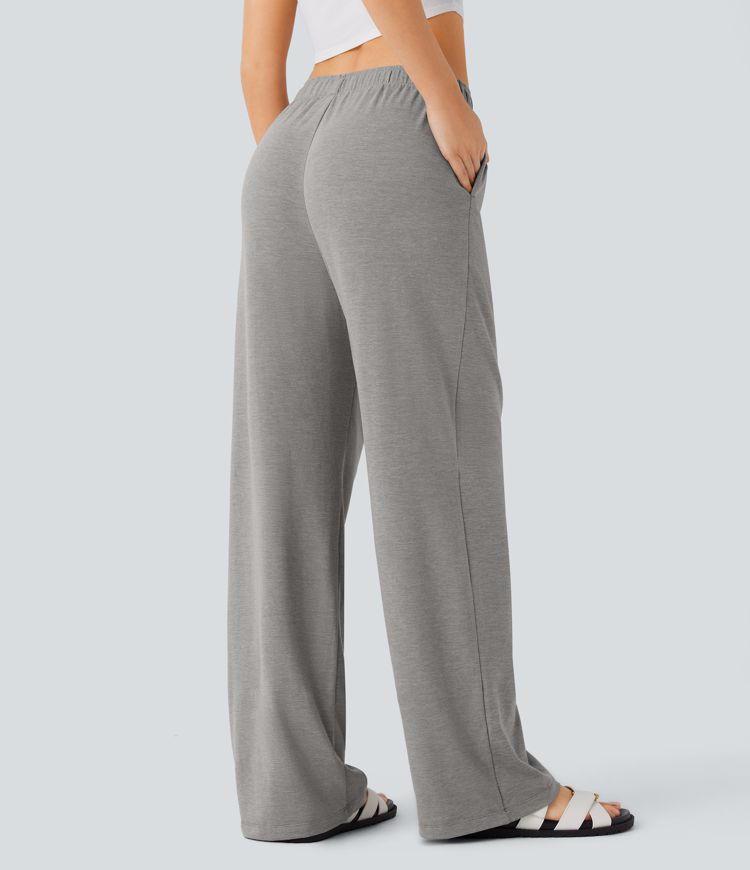 Pantalón tiro alto bolsillo lateral pierna recta dobladillo cordón