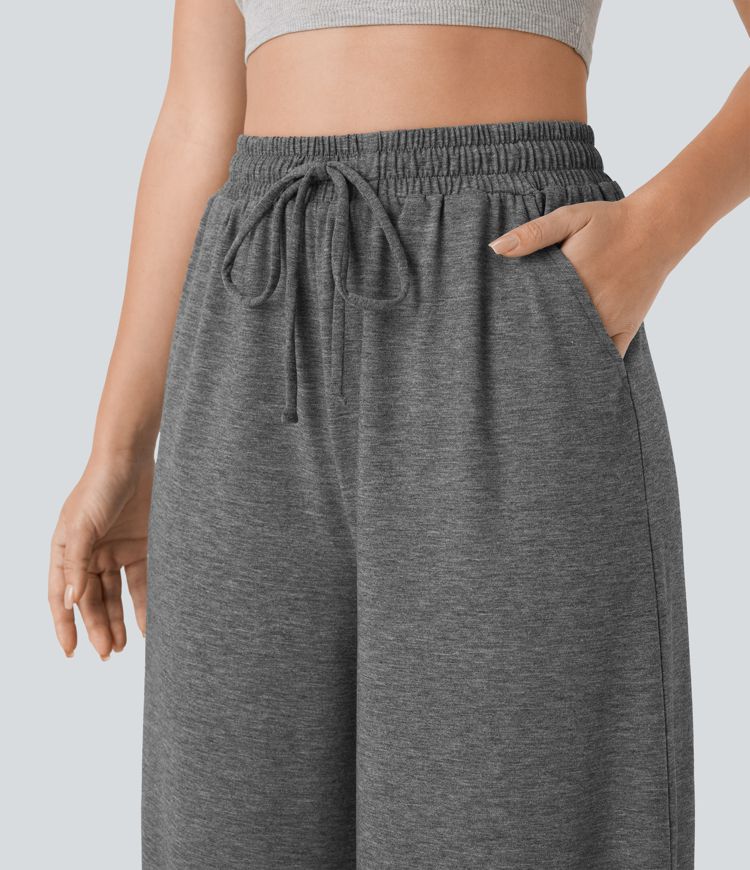 Pantalón capri pierna ancha bolsillo lateral cordón tiro alto