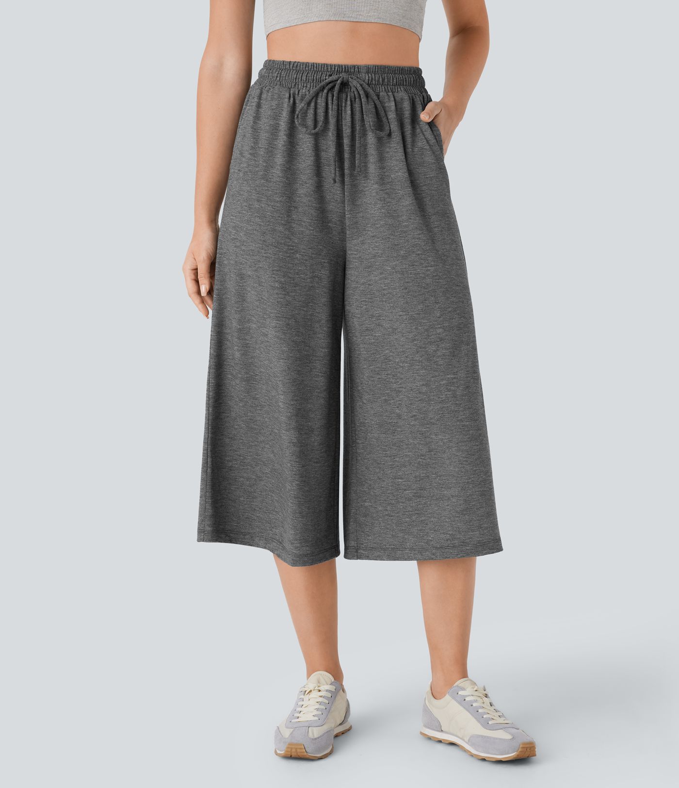 Pantalón capri pierna ancha bolsillo lateral cordón tiro alto