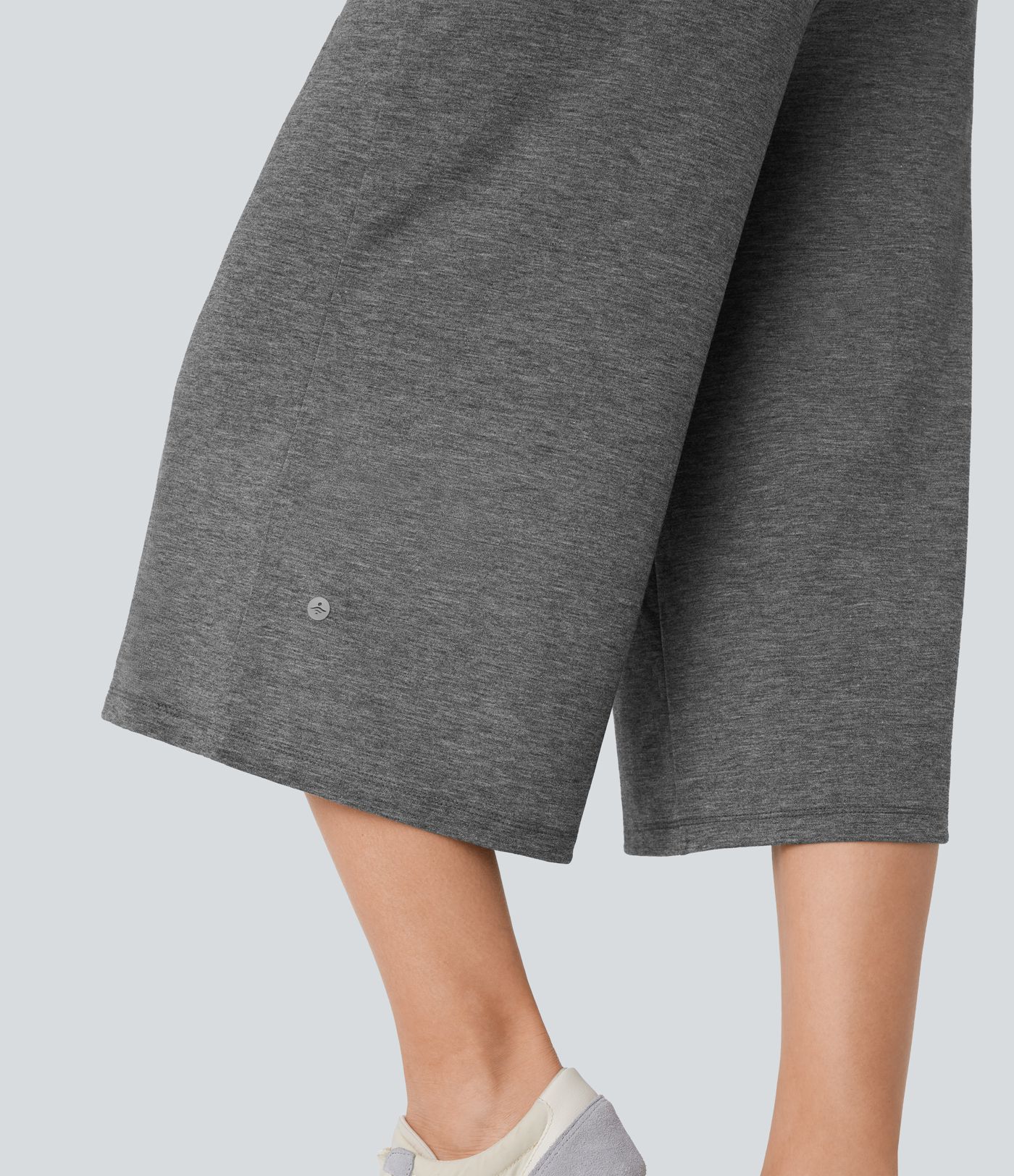 Pantalón capri pierna ancha bolsillo lateral cordón tiro alto