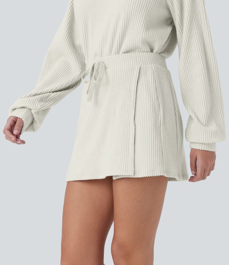 Mini-jupe décontractée 2-en-1 en maille côtelée, taille moyenne, cordon de serrage, fente et poche arrière