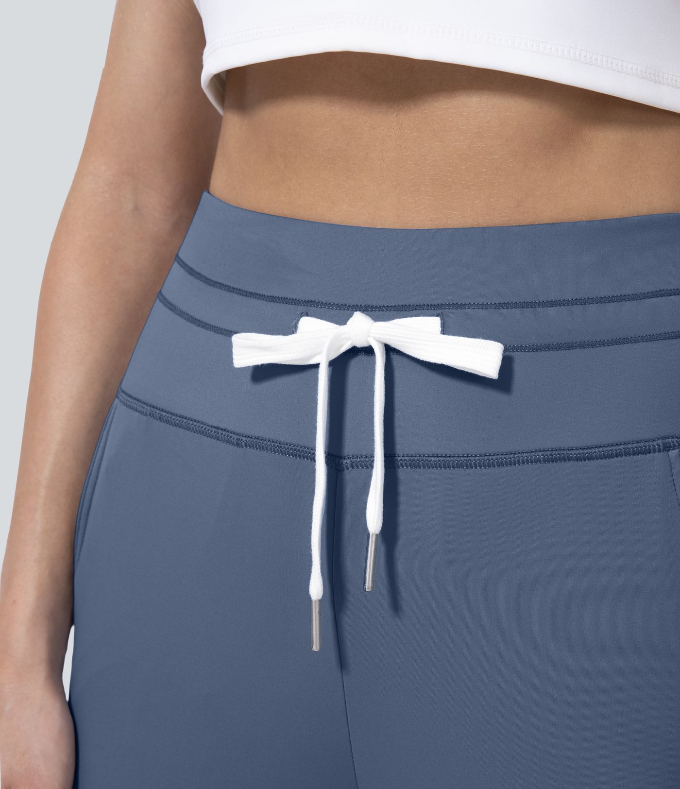Pantalón yoga capri liso bolsillo lateral cordón tiro alto Softlyzero™ Plush