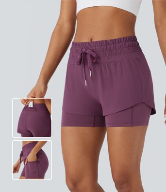 Short de course Breezeful™ mi-hauteur avec cordon de serrage, poches, ourlet incurvé 2-en-1 à séchage rapide