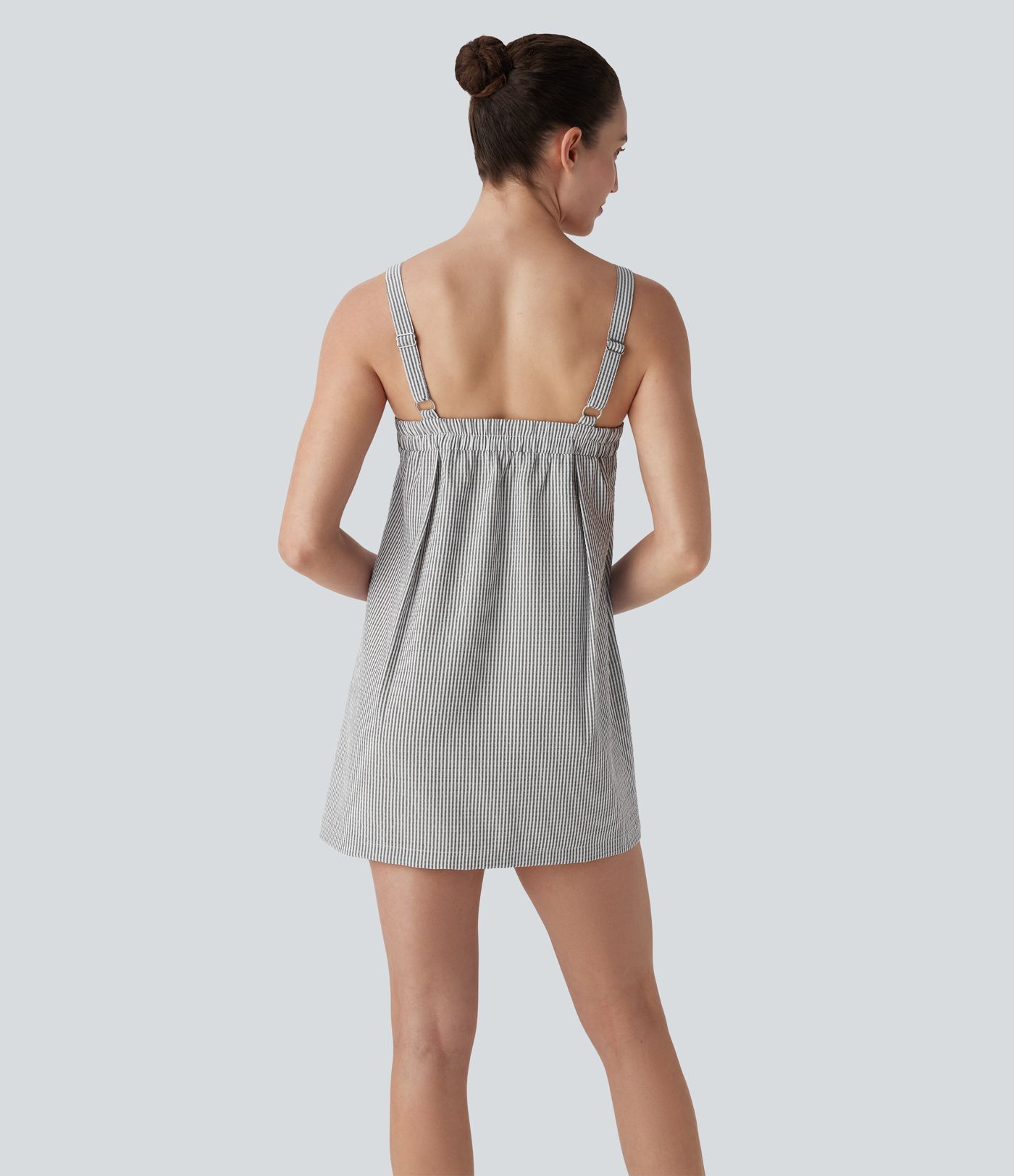 Vestido mini de playa a rayas con espalda descubierta y bolsillos