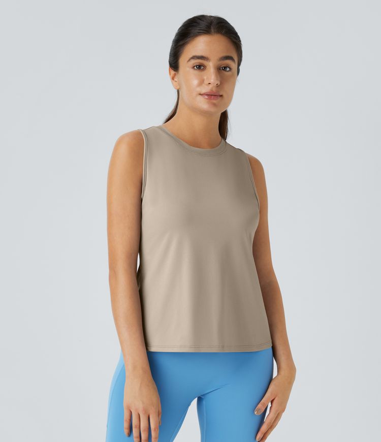 Zkrácený sportovní top s překříženým lemem a plnou barvou pro jógu