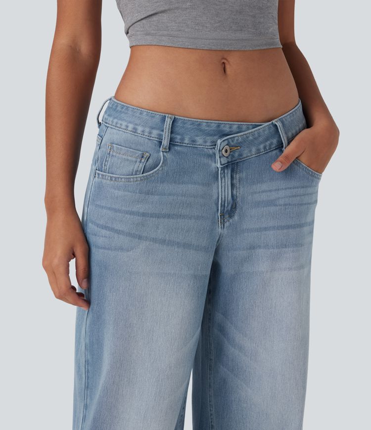 Halara Flex™ Jean large asymétrique taille basse avec bouton, fermeture éclair et poches multiples, délavé et extensible en maille