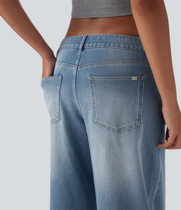 Halara Flex™ Jean large asymétrique taille basse avec bouton, fermeture éclair et poches multiples, délavé et extensible en maille