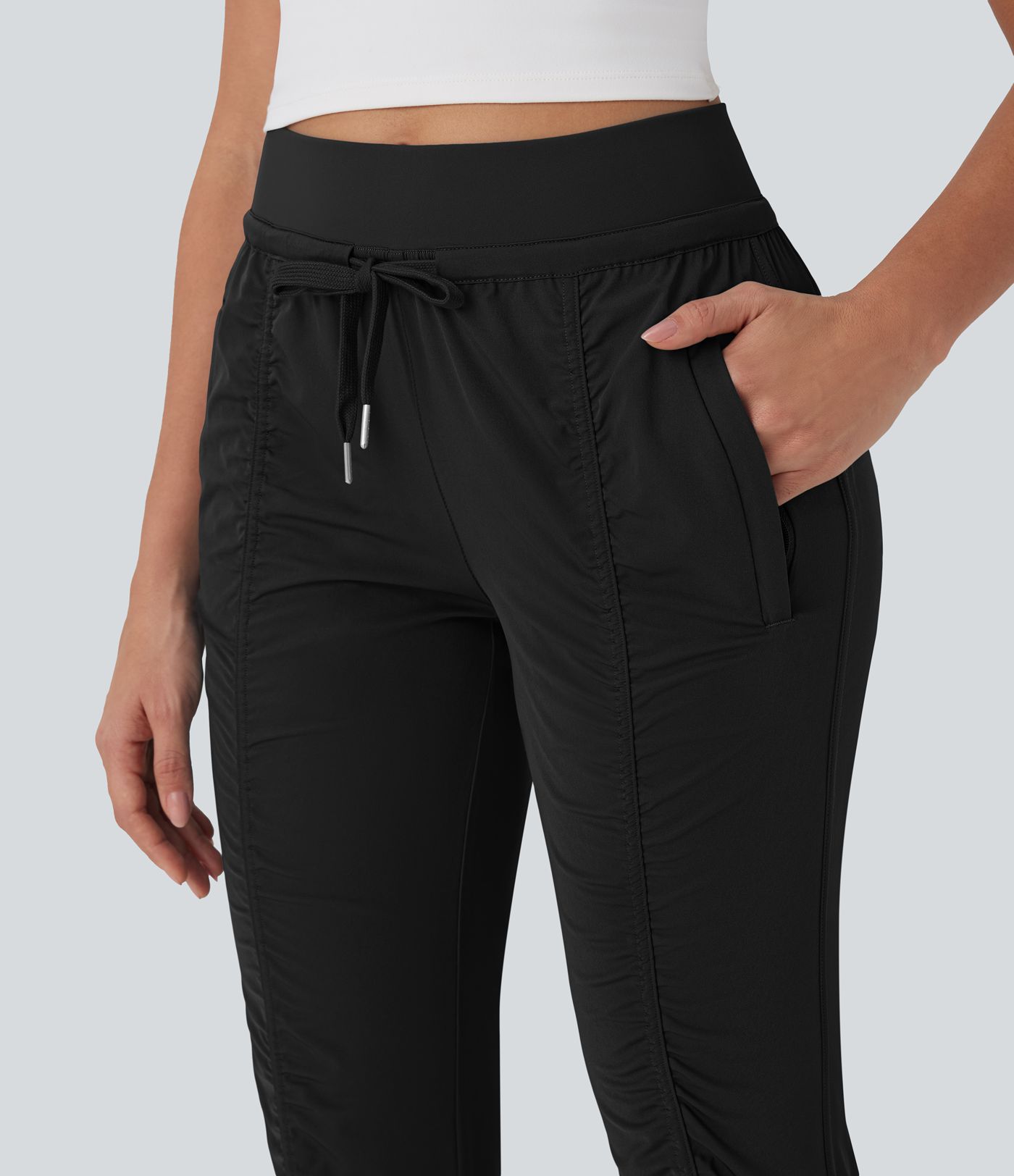 Joggers de Voyage Fuselés à Taille Haute avec Poches Zippées sur le Côté et Cordon de Serrage